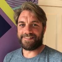 A headshot of John Flavell